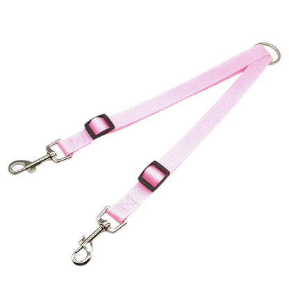 Pink double dog leash from Kritter Krush with two adjustable handles for walking two dogs simultaneously.