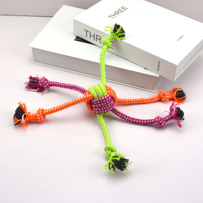 Colorful rope knot toy for dogs by Pawzena Palace featuring durable braided cotton for chewing and tugging fun.