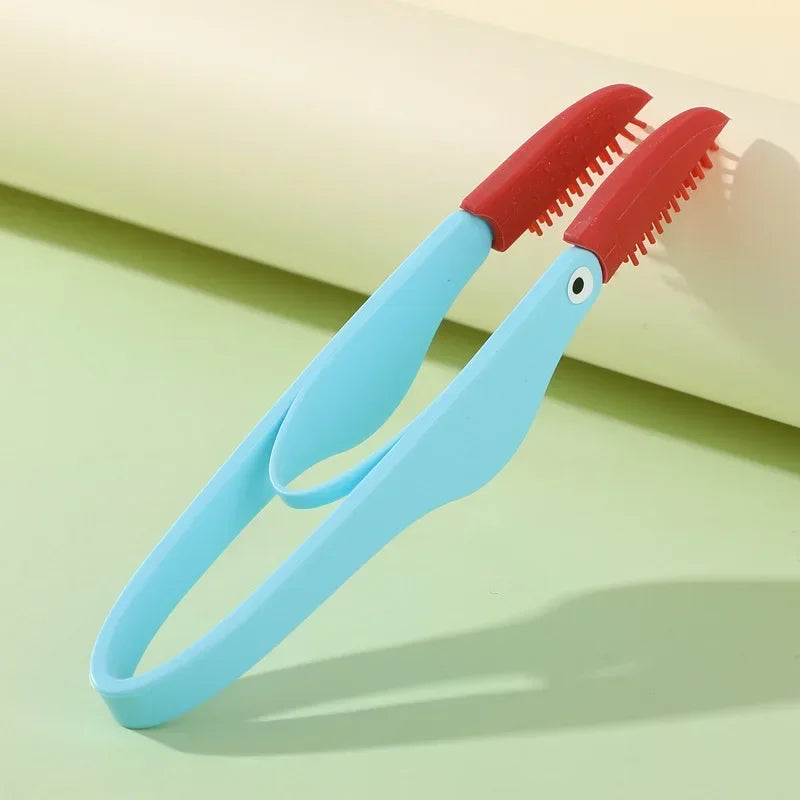 Kritter Krush eye cleaning brush with soft bristles for gentle pet eye cleaning, shown on a white background.