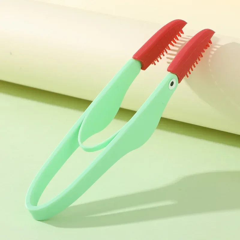 Kritter Krush eye cleaning brush with soft bristles and handle for gentle pet eye care, shown in a close-up image.