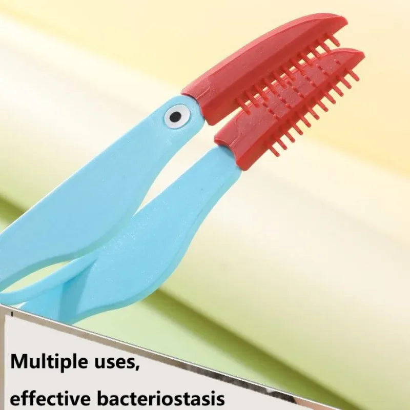 Kritter Krush eye cleaning brush with soft bristles for gentle eye care and removal of debris from pets' eyes.
