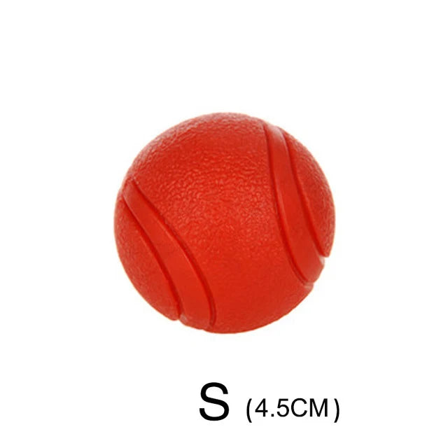 Kritter Krush rubber training ball for pets, durable and lightweight, shown in close-up with textured surface and vibrant color.