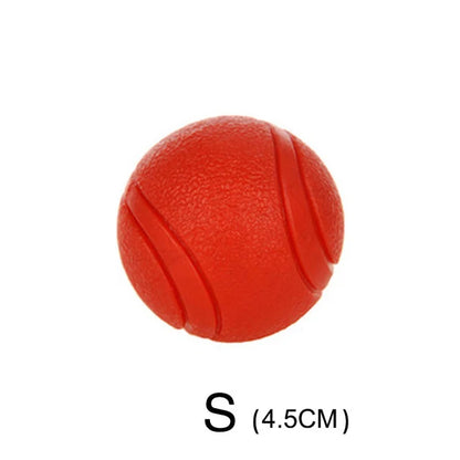Kritter Krush rubber training ball for pets, durable and lightweight, shown in close-up with textured surface and vibrant color.