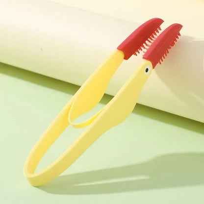Kritter Krush eye cleaning brush with soft bristles for gentle eye care, shown on a white background.