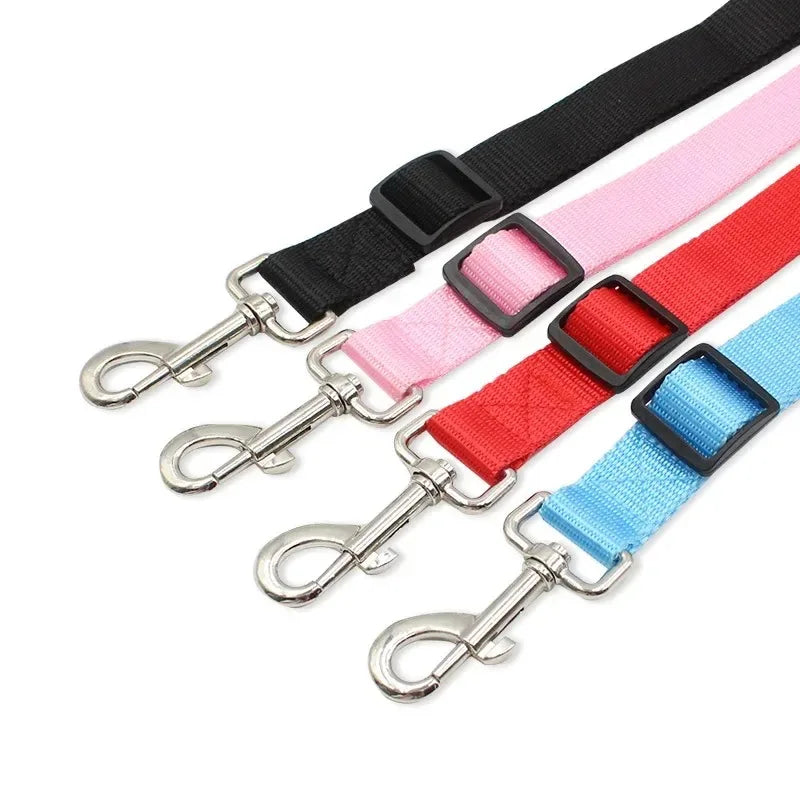 Double dog leash by Kritter Krush featuring durable nylon straps and metal clips for walking two dogs simultaneously.