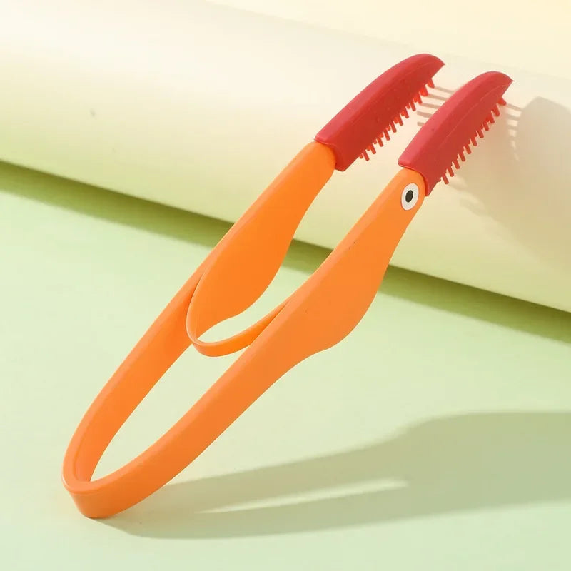 Kritter Krush eye cleaning brush with soft bristles for gentle eye care and cleaning.