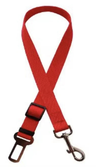 Kritter Krush pet seat belt attached to a car seat, adjustable strap ensuring safety for dogs during car travel.